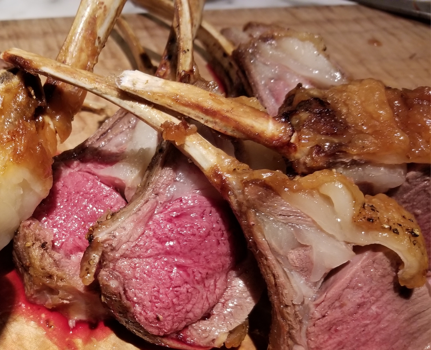 Cooked Frenched Rack sliced and ready to share at the table